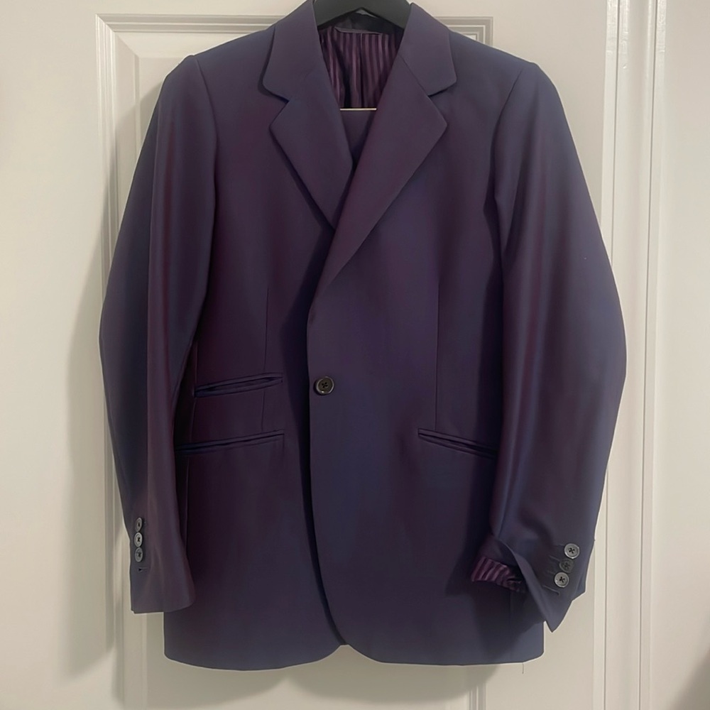 Size 10/12 suit. Beautiful sheen that makes the suit appear a dark purple/blue.